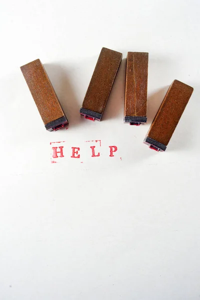 Escrito, Ajuda, com pequenos selos — Fotografia de Stock