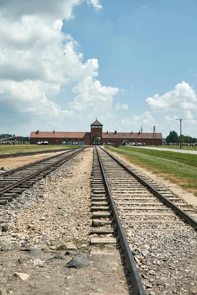 stock image Auschwitz-Birkenau gate, railway road, memorial complex