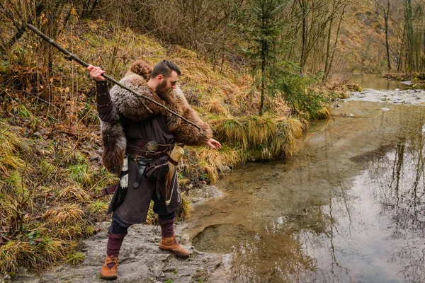 Viking fisherman on the river — Stock Photo, Image