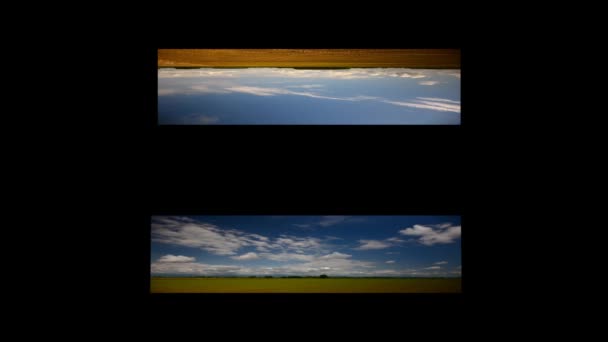 Image of green field and bright blue sky; timelapse — Stock Video