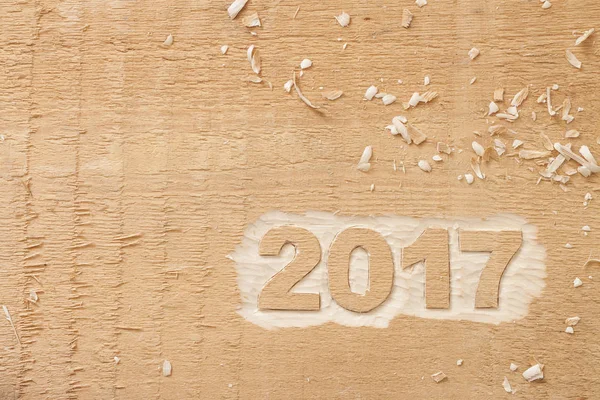 Symbol from number 2017 on wooden texture — Stock Photo, Image