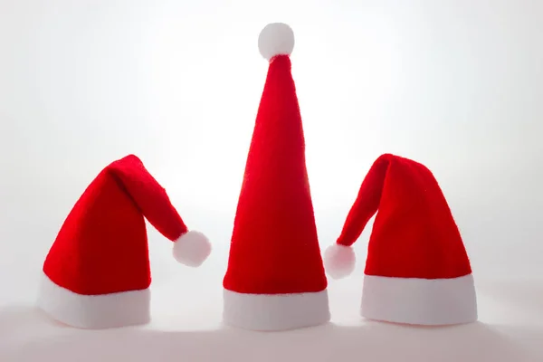 Boże Narodzenie trzy czapki od Świętego Mikołaja — Zdjęcie stockowe