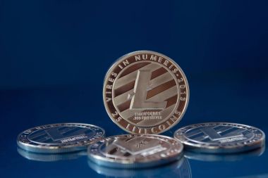 Silver Litecoin on the glass background clipart