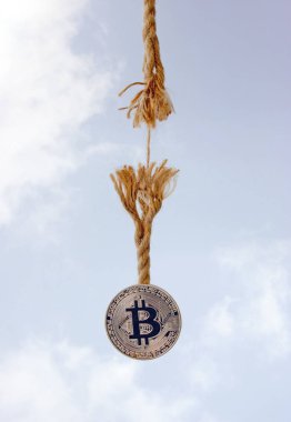 Kripto para birimi bir ip iş parçacığı üzerinde asılı