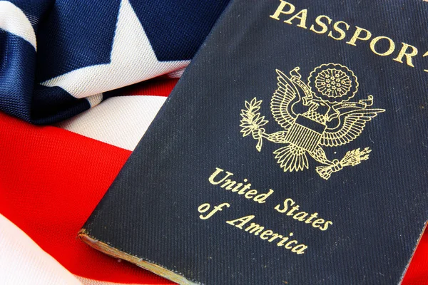 USA passport on The US flag — Stock Photo, Image