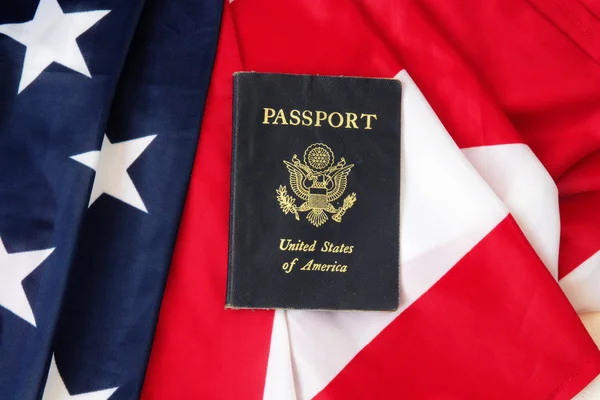 USA passport on The US flag — Stock Photo, Image