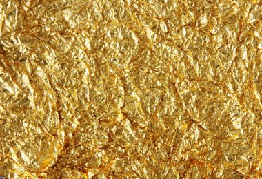 Parlak sarı altın folyo doku arka plan