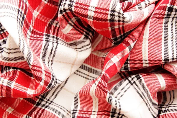 Toalha de mesa de tecido vermelho branco cores pretas. foco seletivo — Fotografia de Stock