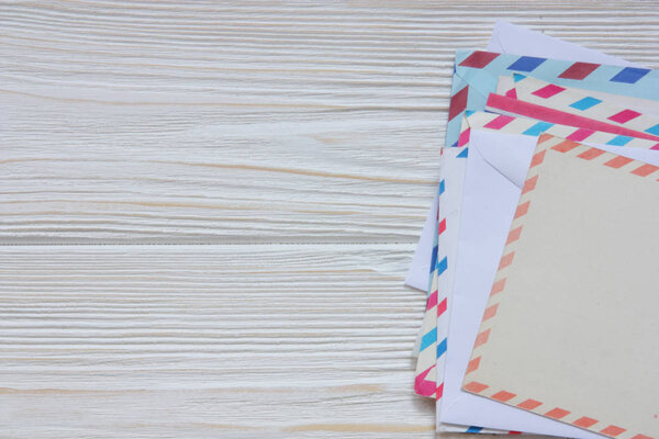 old envelopes and cards on wooden back