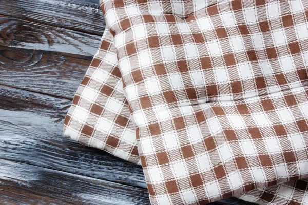 Checkered Pillows Brown Wooden Panel — Stock Photo, Image