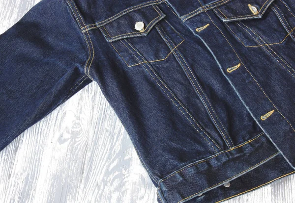 detail of denim jacket