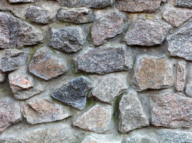 Taş duvardan büyük granit parke taşı yakın çekim