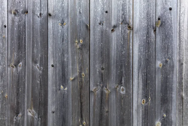 Viharvert öreg szürke fából készült kerítés közelről — Stock Fotó