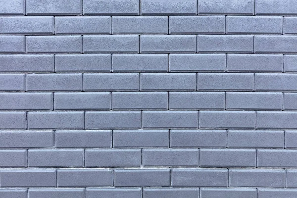 Texture d'un mur d'une brique grise — Photo