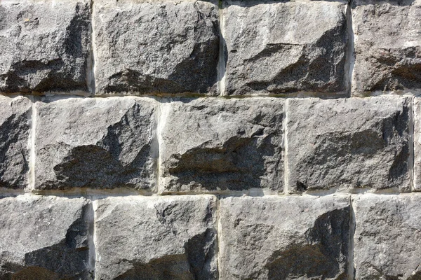 古老石墙的质感 灰色花岗岩的石子 作为石墙的背景 旧石子卵石的文摘背景 — 图库照片