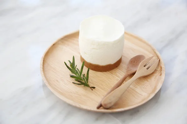 Cheese cake on wood — Stock Photo, Image