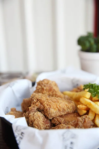 Fried chicken on wood background — Stock Photo, Image