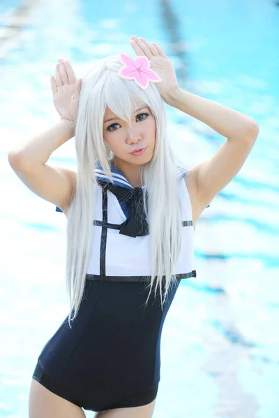 Asiatische cosplay Mädchen mit schwimmen suite — Stockfoto