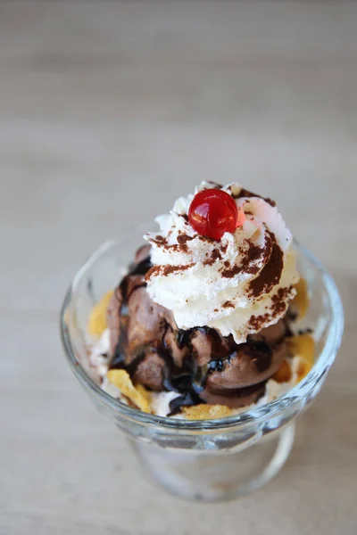 Chocolate icecream on wood background — Stock Photo, Image