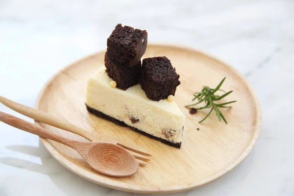 Brownie cheese cake on wood plate — Stock Photo, Image