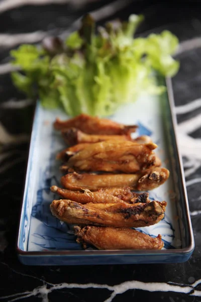 Asas de frango fritas — Fotografia de Stock