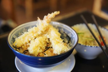 Tempura don , Fried shrimp japanese style on rice clipart