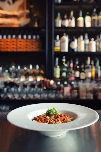 Spaghetti bolognese in dark tone — Stock Photo, Image