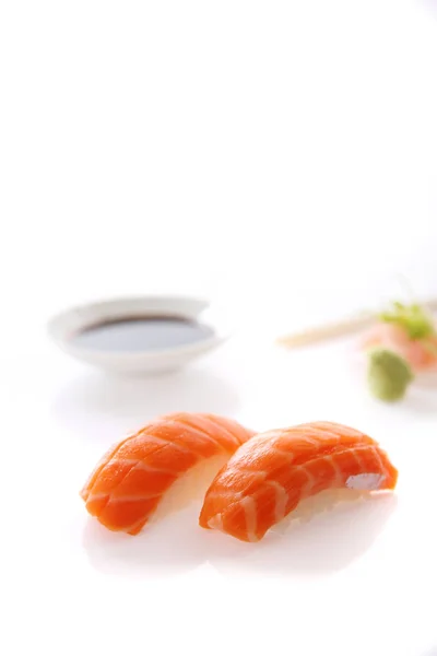 Salmon sushi japanese food isolated in white background — Stock Photo, Image