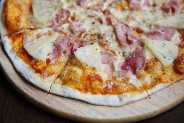 pizza hawaiian , pizza with pineapple and ham with cheese and to