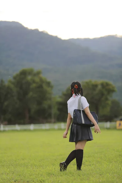 Portrait of japanese school girl outdoor in countryside — Stock Photo, Image