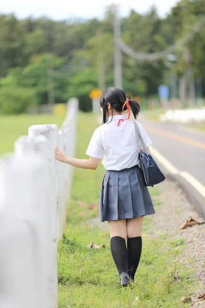 Japanese school in countryside with grass mountain and tree — Stock Photo, Image