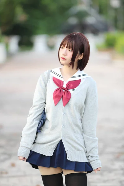 Portrait of Japanese school girl with countryside park — Stock Photo, Image