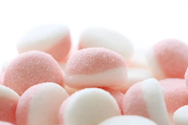 Růžové želé bonbóny izolován v bílém pozadí — Stock fotografie