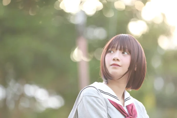 Portrait of Japanese school girl with countryside park — Stock Photo, Image
