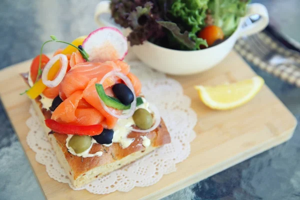 Smoked salmon on toast with salad vegetable