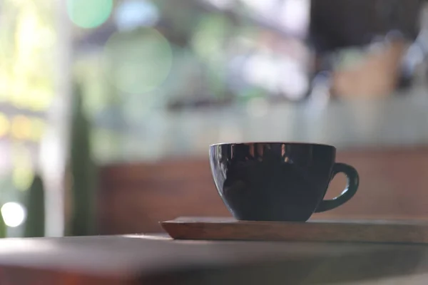 Cappuccino coffee break on wood background