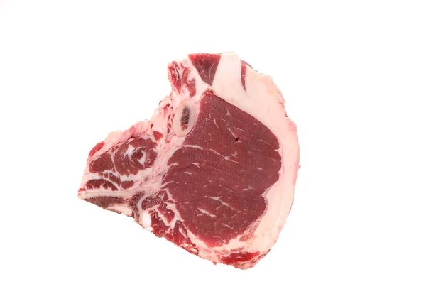 Syrové hovězí t kostí steak izolován v bílém pozadí — Stock fotografie