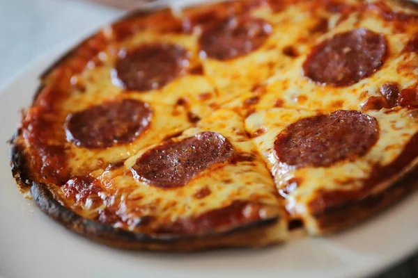 Pepperoni pizza on dish , italian food — Stock Photo, Image