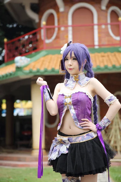 Portrait of asian young woman with purple Chinese dress cosplay — Stock Photo, Image