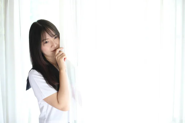 Portrait japanese school girl in white tone bed room — Stock Photo, Image