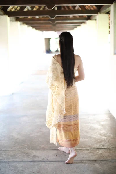 Portrait of Thai female with traditional Thai dress walking with — Stock Photo, Image