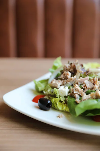 Tuna salad appetizer on wood background — Stock Photo, Image