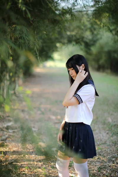 Portrait Beautiful Asian Japanese High School Girl Uniform Looking Bamboo — Stock Photo, Image