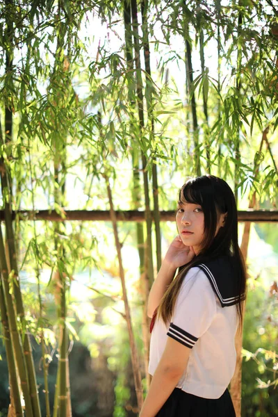 Portrait Beautiful Asian Japanese High School Girl Uniform Looking Bamboo — Stock Photo, Image