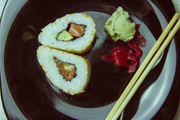 Fresh sushi with chopsticks — Stock Photo, Image