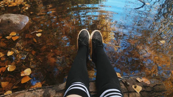 Woman legs in black socks — Stock Photo, Image