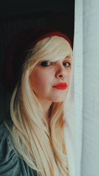 Portrait Young Blonde Woman Red Lips Hat Sweater Window — Stock Photo, Image