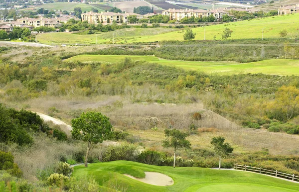 Green golf field on a hill — Stock Photo, Image