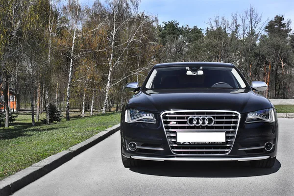 Kiev, Ukraine; June 25,  Audi S8 in the park on the alley. Editorial photo. Stock Picture