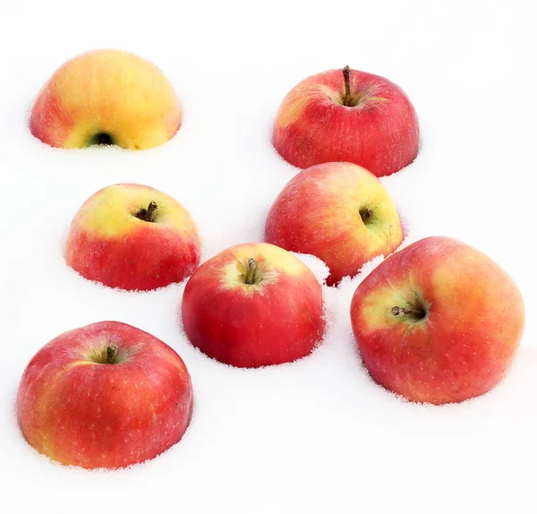 Apples in the snow — Stock Photo, Image